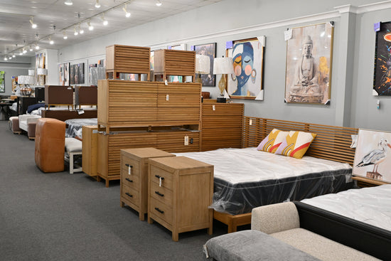 Bedroom furniture collection featuring beds, dressers, nightstands, and chests at Precious Cargo Furniture